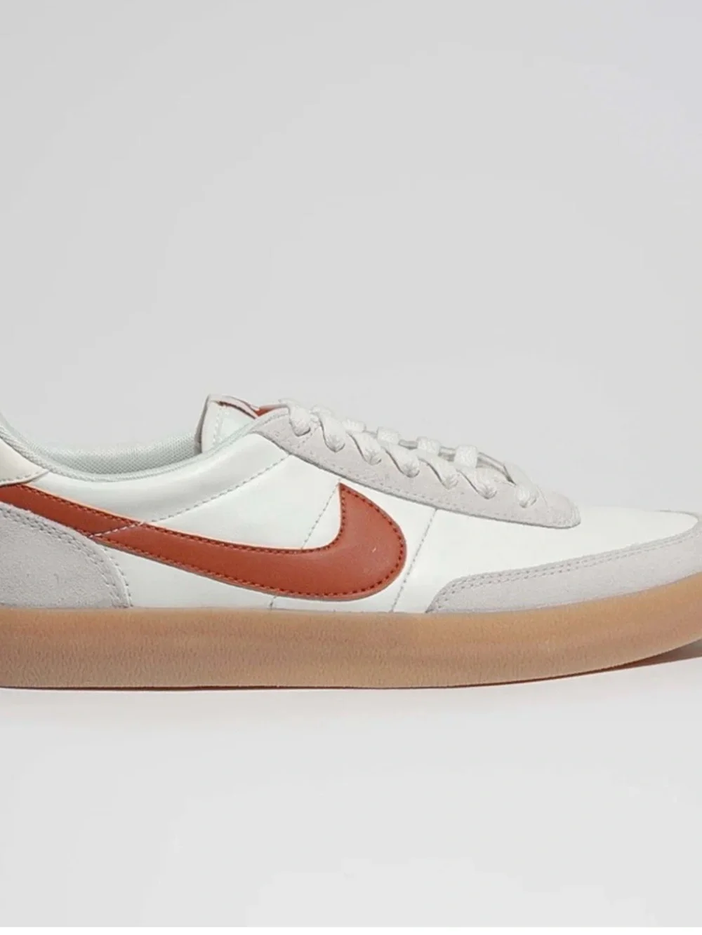 Nike White Leather Low-Top Sneaker with Rust Swoosh